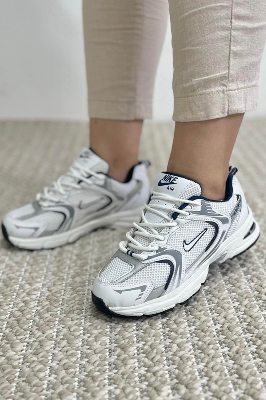 کتونی زنانه سفید سورمهای مدل اِلورا با زیره EVA مناسب پیادهروی