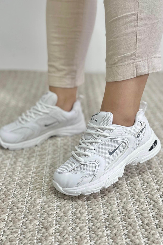 کتونی زنانه سفید مدل اِلورا با طراحی مینیمال و زیره EVA راحت